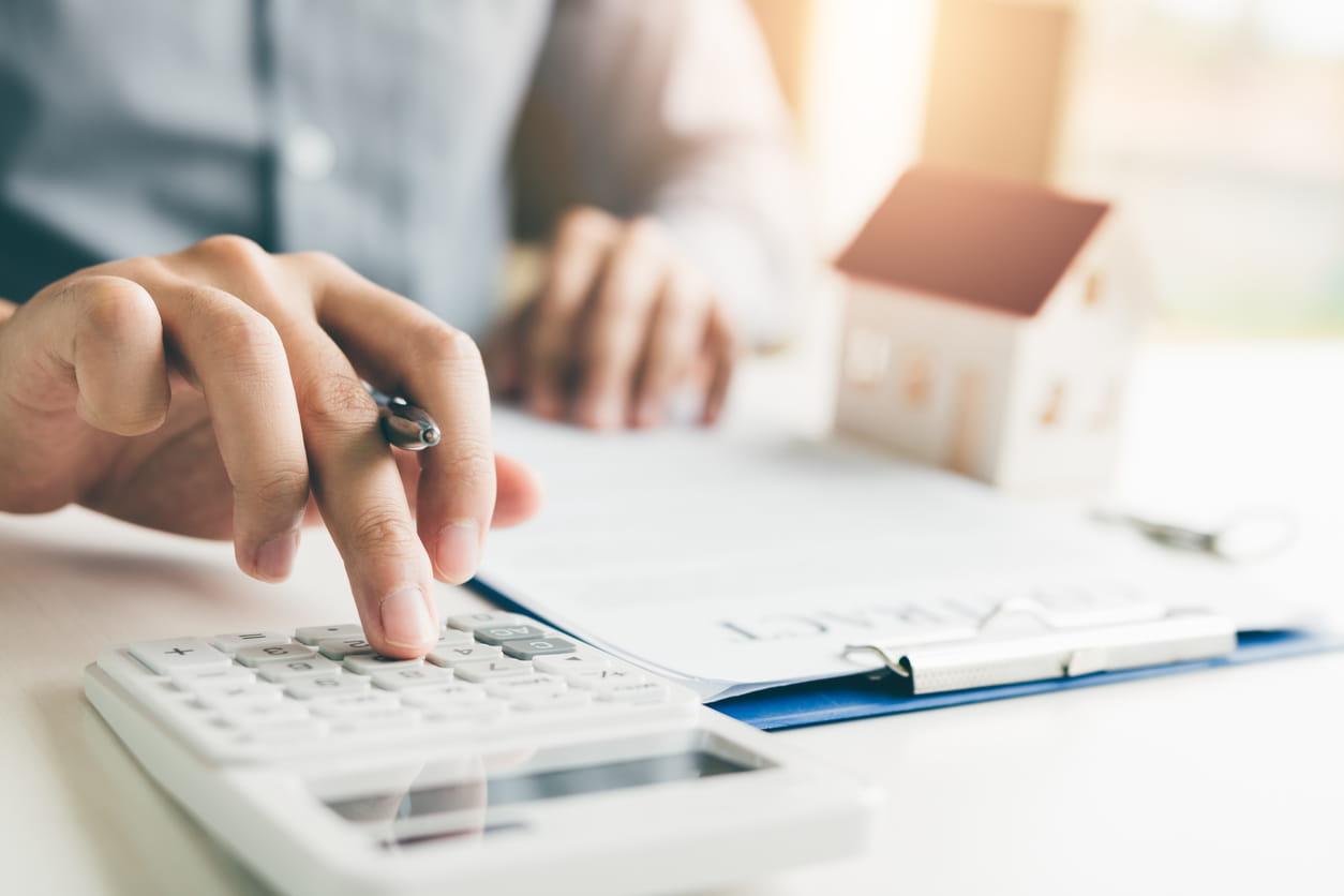 person working out sale vs rent for commercial property